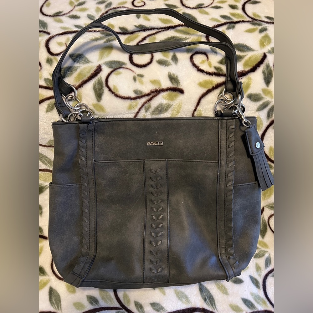 Gray leather handbag with multiple pockets